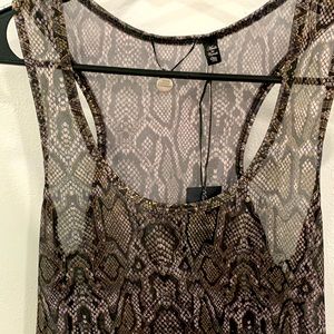 BKE top Med. black grey with gold shimmer. New with tags. Sheer